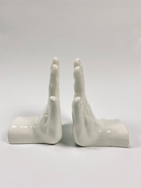 Ceramic hand-shaped bookstand