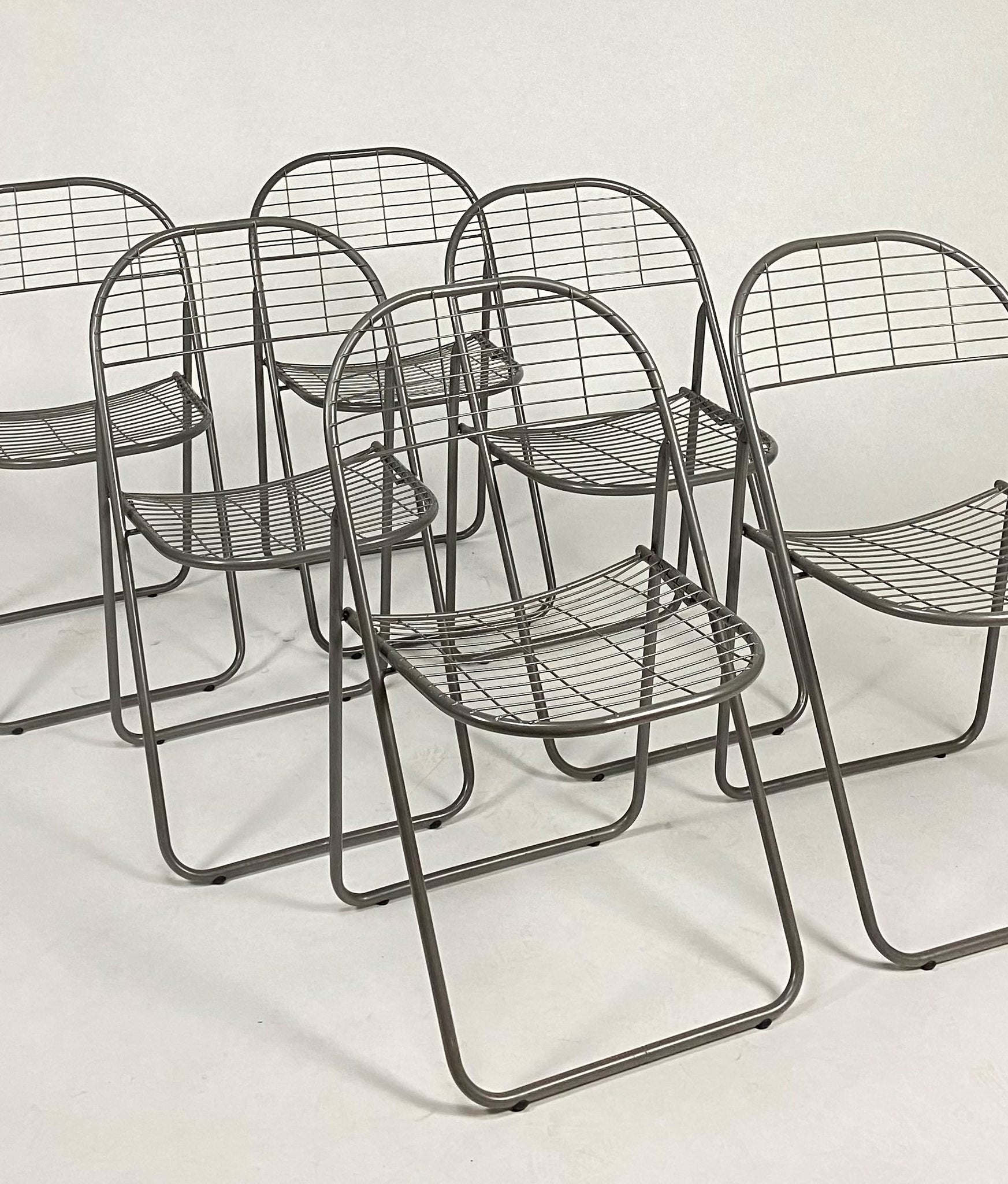 foldable wire chairs by Niels Gammelgaard