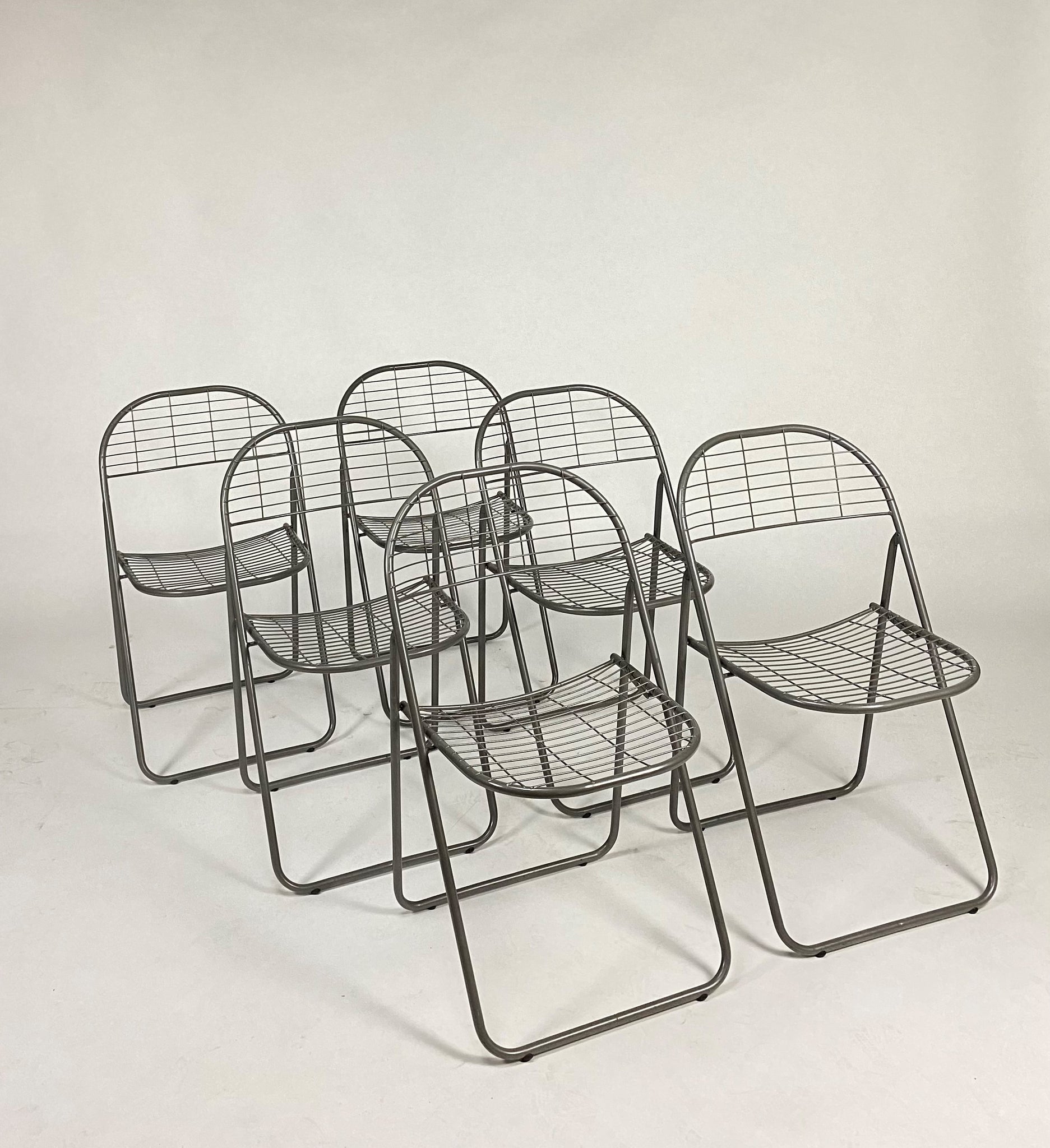 foldable wire chairs by Niels Gammelgaard